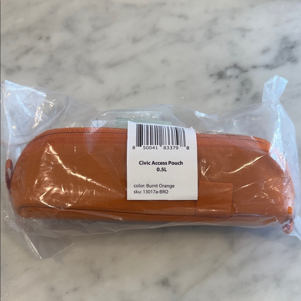 CIVIC ACCESS POUCH 0.5L - burnt orange